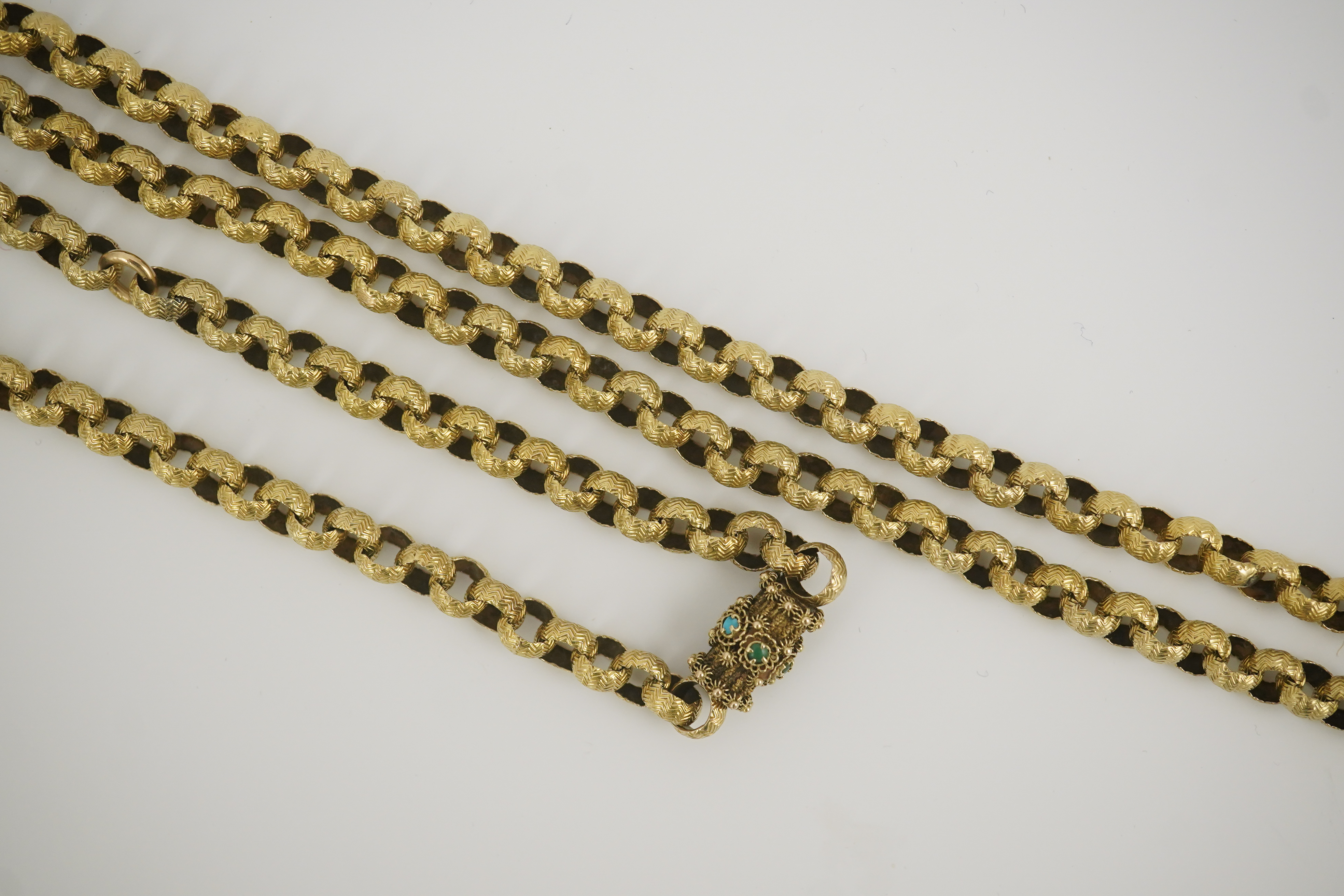 A Georgian gold textured circular link muff chain, with turquoise cluster set barrel shaped clasp